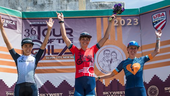Austin Killips (centre) on the podium after a stage victory in New Mexico.