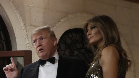 US President Donald Trump, with First Lady Melania, speaks about the attack on the  US embassy in Baghdad ahead of his New Year's Eve party.