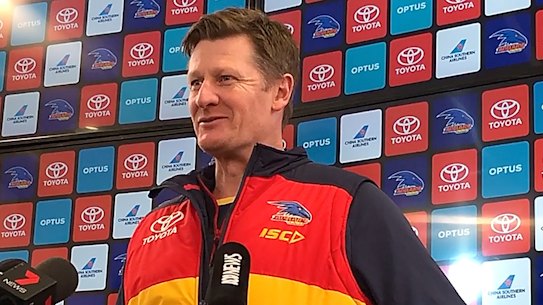Crows assistant coach Ben Hart has been stood down for six weeks, while 16 players received suspended one match sanctions for a COVID-19 protocol breach. 