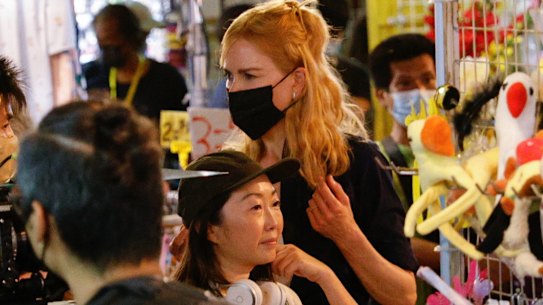 Australian actor Nicole Kidman acts during the filming of a scene for the Amazon Prime series “Expats” in Hong Kong on Monday. She was spotted at a COS shop last week.