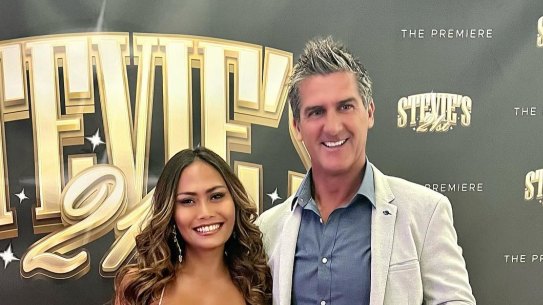 Essendon premiership player Ricky Olarenshaw and his wife, Sarnanitha, in 2023.