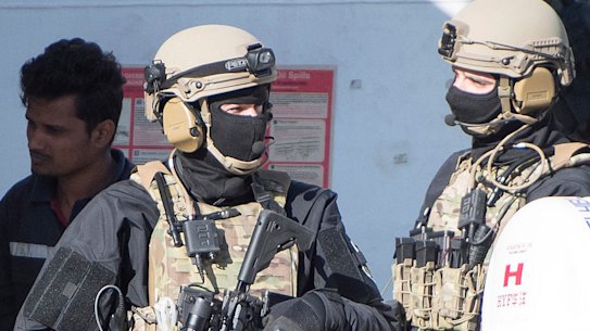 Armed forces aboard the Turkish oil tanker El Hiblue 1, which was hijacked by migrants. 