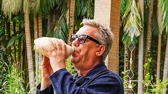 Brian Ritchie from the Violent Femmes blows into a conch shell at Bleach*.