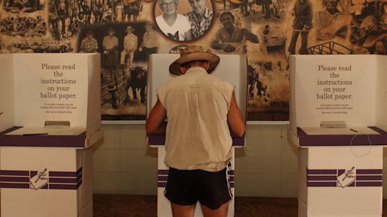 A man votes at The Annaburroo Bark Hut on the Arnhem highway in the ward of Maraki in the Northern Territory in the seat of Lingiari.