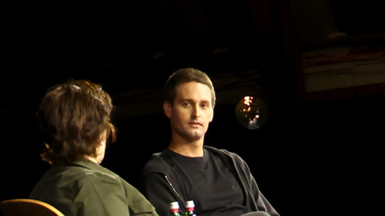 Snap chief executive Evan Spiegel is interviewed on stage at the company’s April 2023 conference where it announced its AI chatbot would be free for all users.