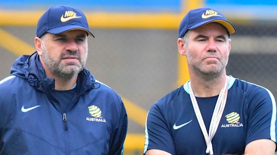 Australia head coach, Ange Postecoglou, left, and his assistant Ante Milicic watch their players during a training session at the Francisco Morazan Stadium in San Pedro Sula, Honduras, Tuesday, Nov. 7, 2017. Australia and Honduras will face for the first leg of the World Cup playoff on Friday. (AP Photo)