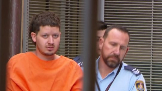 Mert Ney is led from the NSW Supreme Court on Monday.