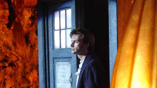 David Tennant, who is returning as Doctor Who, exits the TARDIS.