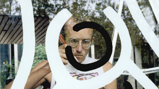 Keith Haring working on his NGV mural in February 1984. 