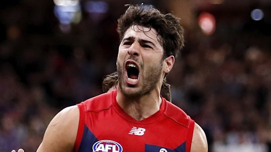 Petracca celebrates a goal.