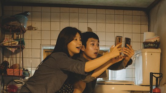 Ki-jung (Park So-dam), left, and Ki-woo (Choi Woo-sik) are smart and attractive, but apparently unemployable in Parasite.