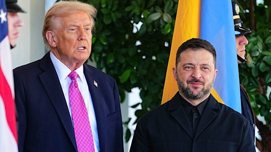 Donald Trump greets Volodymyr Zelensky at the White House.