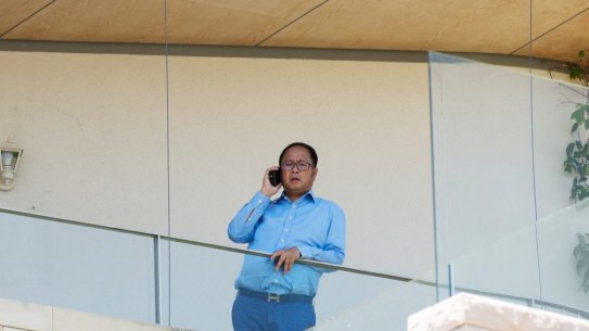 Chinese donor and gambler Huang Xiangmo pictured on the balcony of his Mosman mansion last year.