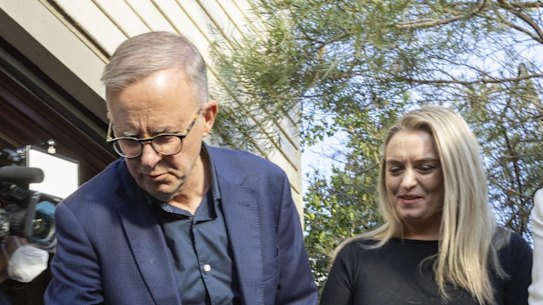 Opposition Leader Anthony Albanese meets Reverend Rosemary Wynter (left) and her dogs in Bangalow, NSW.