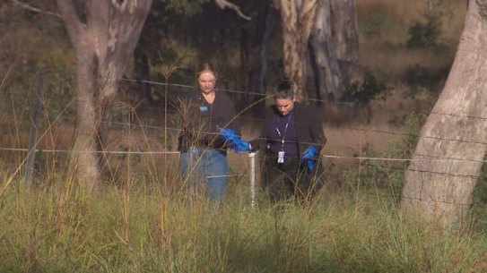 Police search the Coonabarabran property where the boys’ bodies were found.