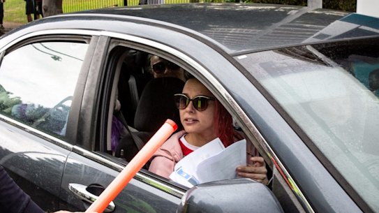 Police check cars for permits at a checkpoint in Coolangatta as the Queensland border re-opened to most other states on July 10.