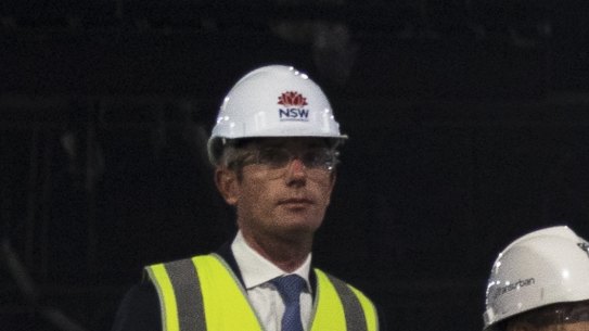 Premier Dominic Perrottet, Minister for Metropolitan Roads Natalie Ward and Transurban’s Terry Chapman inside the WestConnex motorway M4-M5 link.