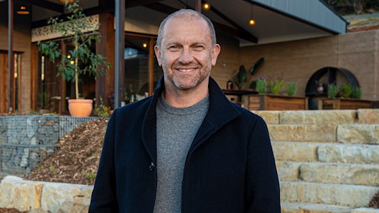 Grand Designs Australia host outside the Earthship house in Tasmania featured in episode one.