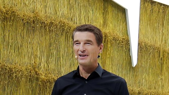 Polestar chief executive Thomas Ingenlath with one of the company’s electric vehicles 