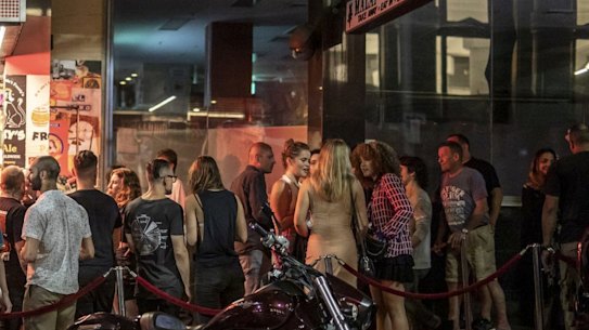 Night owls line up to get into Frankies as they celebrate the end of lockout laws on Tuesday night.
