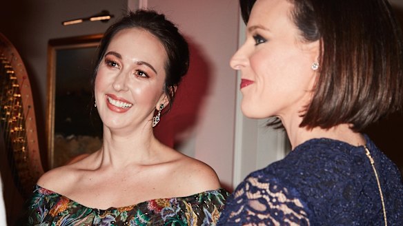 Pink Hope founder Krystal Barter (L) and Channel Ten news' Natarsha Belling (R) mingle at a dinner at The Langham, Sydney, on Monday to celebrate the launch of Pink Hope's new online test.
