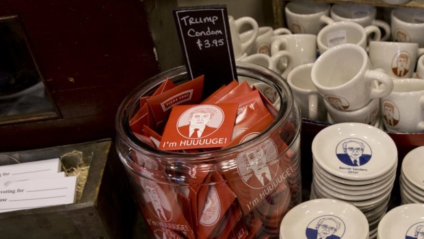 Donald Trump merchandise – including 'I'm huuuuge' condoms – are displayed along with material by Democratic presidential candidate Bernie Sanders.