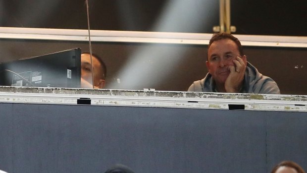 Ricky Stuart of the Raiders look on from the coaches box.
