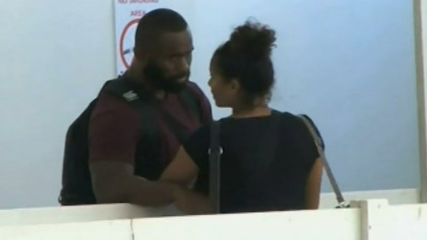 Departure: Semi Radradra says goodbye to a mystery woman at Nadi Airport on Tuesday.