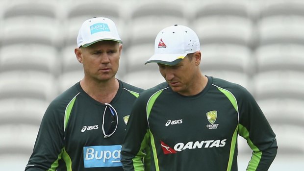 Trying time: Brad Haddin (right) speaks with Australian Team Psychologist Michael Lloyd speaks at Lord's.
