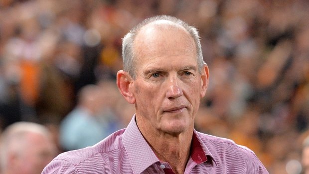 Is that a hint of a smile: Broncos coach Wayne Bennett watches on as his team celebrates victory over the Roosters.