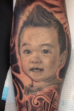 Skill is needed to avoid turning babies into Winston Churchill: a portrait by Angus Wood of LDF Tattoos.