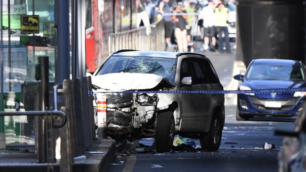 The SUV hit pedestrians before smashing into a tram stop.