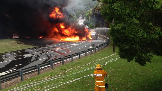 The truck ablaze on the Mona Vale bend.