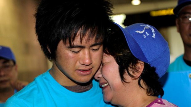 Hong Vo in an emotional reunion with her son Martin after returning from Vietnam in 2010.