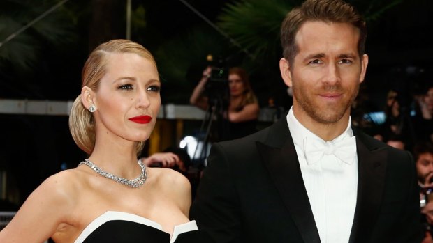 Shaking it out: Blake Lively with husband Ryan Reynolds .