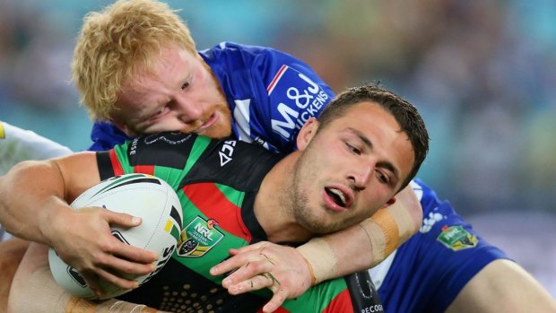 Tensions: An alleged bottle thrown at Rabbitohs prop Nathan Brown was the final scene in a drama-filled clash on Friday night that had earlier seen a blow up between James Graham and Sam Burgess.