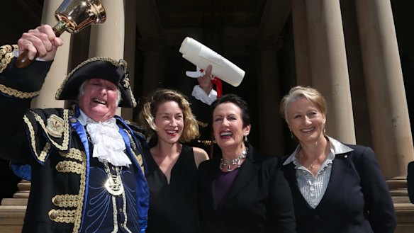 In better days: Town crier Graham Keating, Jess Miller, Sydney Lord Mayor Clover Moore and Professor Kerryn Phelps on the steps of Town Hall at the proclamation of the 2016 council.