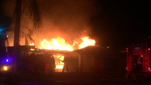 All seven people inside escaped as fire engulfed the Alexandra Hills home.