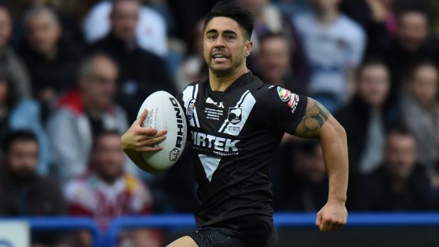 Try time: Shaun Johnson races away to score during the Kiwi's victory over England.