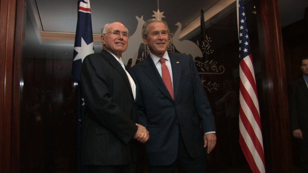 Then prime minister John Howard greets the US President George Bush in his Sydney office in 2007. 