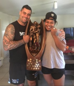 Giving back: Andrew Fifita shows off the NRL trophy in Griffith.