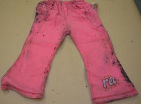 Pink trousers found in the suitcase.