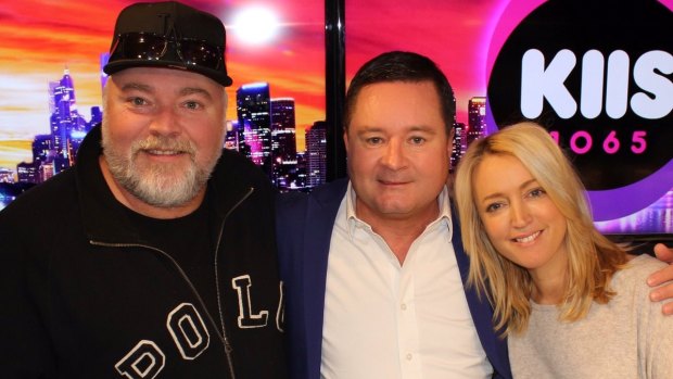 Geoff Field, centre, reunites with Kyle Sandilands and Jackie "O" Henderson at the KIIS FM studio on Tuesday.