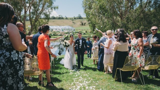 Wicks walked herself down the aisle, while Croker and his groomsmen arrived in a helicopter.