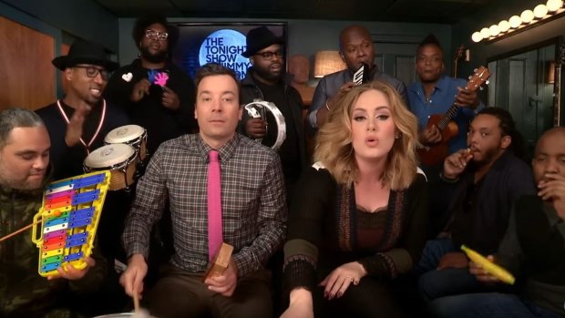 Adele and Jimmy Fallon performing <i>Hello</i> on <i>The Tonight Show</i>.