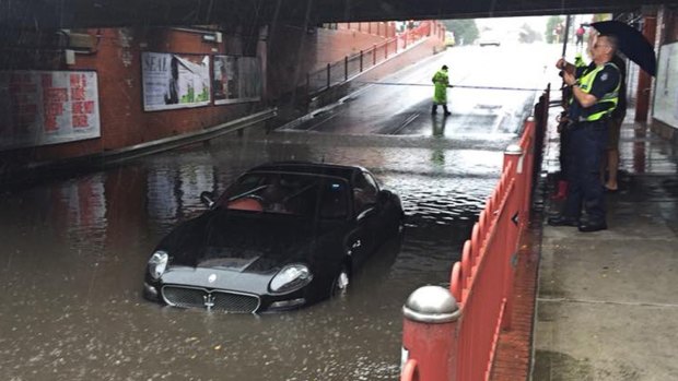 A Maserati was flooded after the driver tried to navigate a flooded underpass in Seddon on Saturday