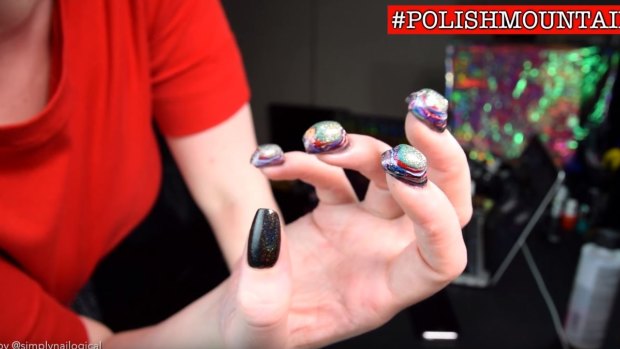 The craze for many layers of make-up started with a '#PolishMountain' challenge.