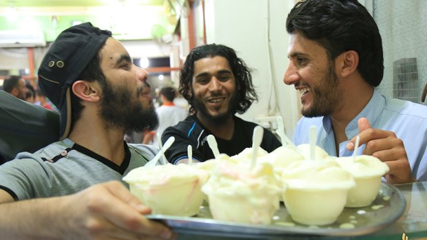 A television channel run by Islamic State  shows ice cream being sold in the IS-held Syrian town of Deir al-Zor. 