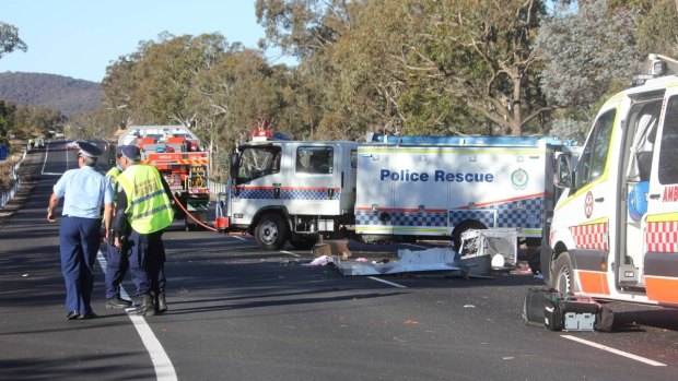 Emergency crews at the scene of a fatal crash on the Hume Highway north of Goulburn.