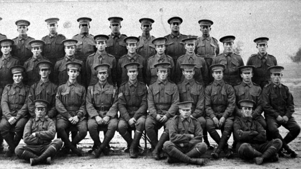 Alec Campbell, second from right seated on the ground, aged 16 years old, just after he enlisted.